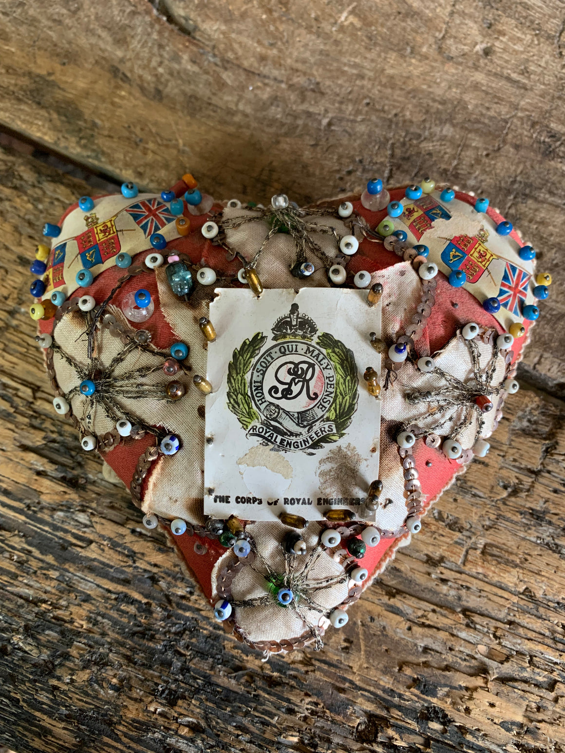 A WWI forget-me-not sweetheart pin cushion