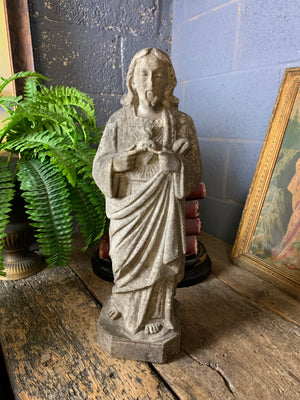A solid marble Sacred Heart Jesus statue