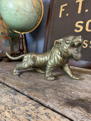 An extra large brass Mid-Century Hollywood Regency tiger statue