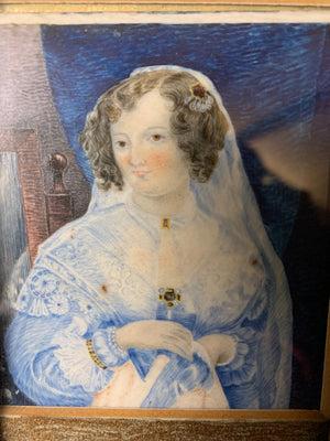 A framed miniature of a woman in blue ~ front view