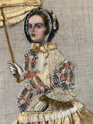 An unusual framed collage of a lady with a parasol