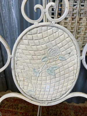 A lattice design garden table and chairs set