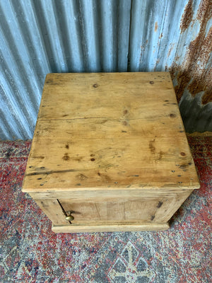 A Victorian square pine cupboard