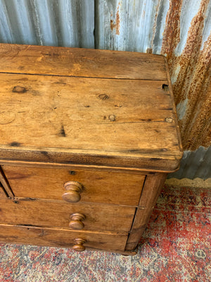 A pine chest of two over two drawers