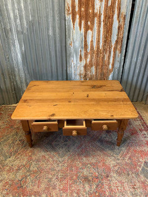 A large pine coffee table