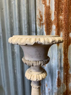 A large stone effect pricket candlestick