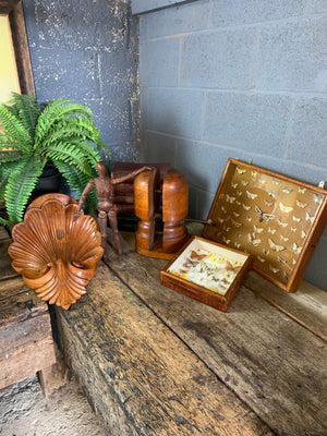 A wooden millinery hat stretcher