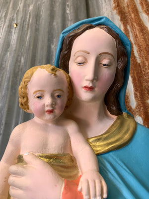 A very large plaster Madonna and Child statue