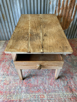 A pine kitchen table by Staines of Westminster