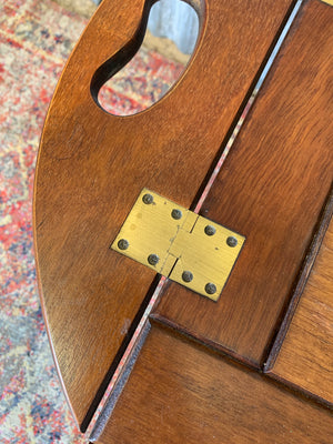 A mahogany butler's tray table