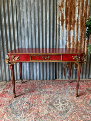 A red lacquer continental table