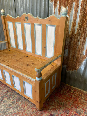 A pine storage settle