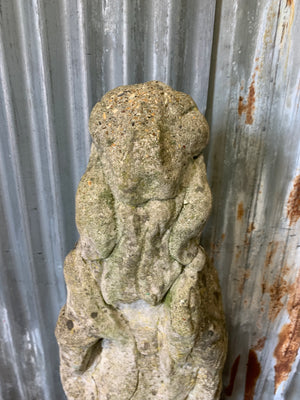 A cast stone garden statue of Guanyin