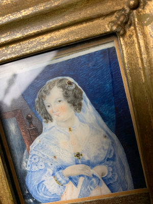 A framed miniature of a woman in blue ~ front view