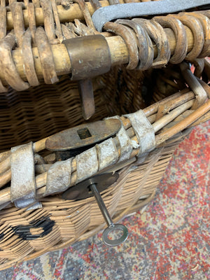 A Victorian wicker laundry basket on castors ~ B