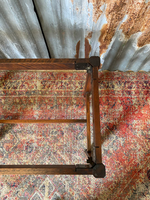 A mahogany butler's tray table