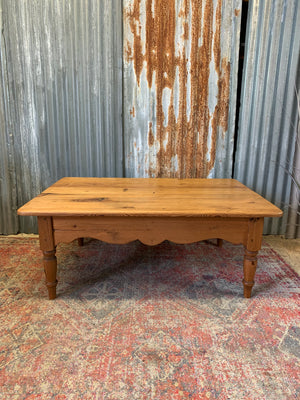 A large pine coffee table