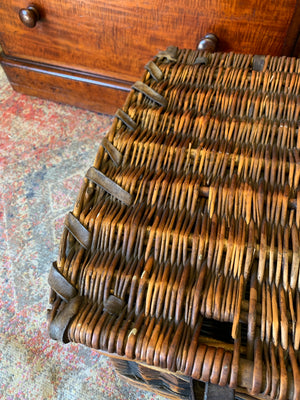 A Victorian wicker laundry basket