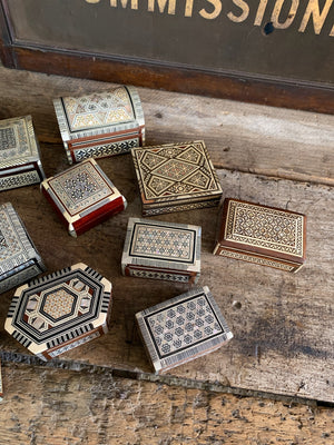 A collection of 12 mother of pearl inlaid Syrian boxes