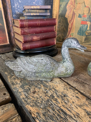 A pair of garden duck figures