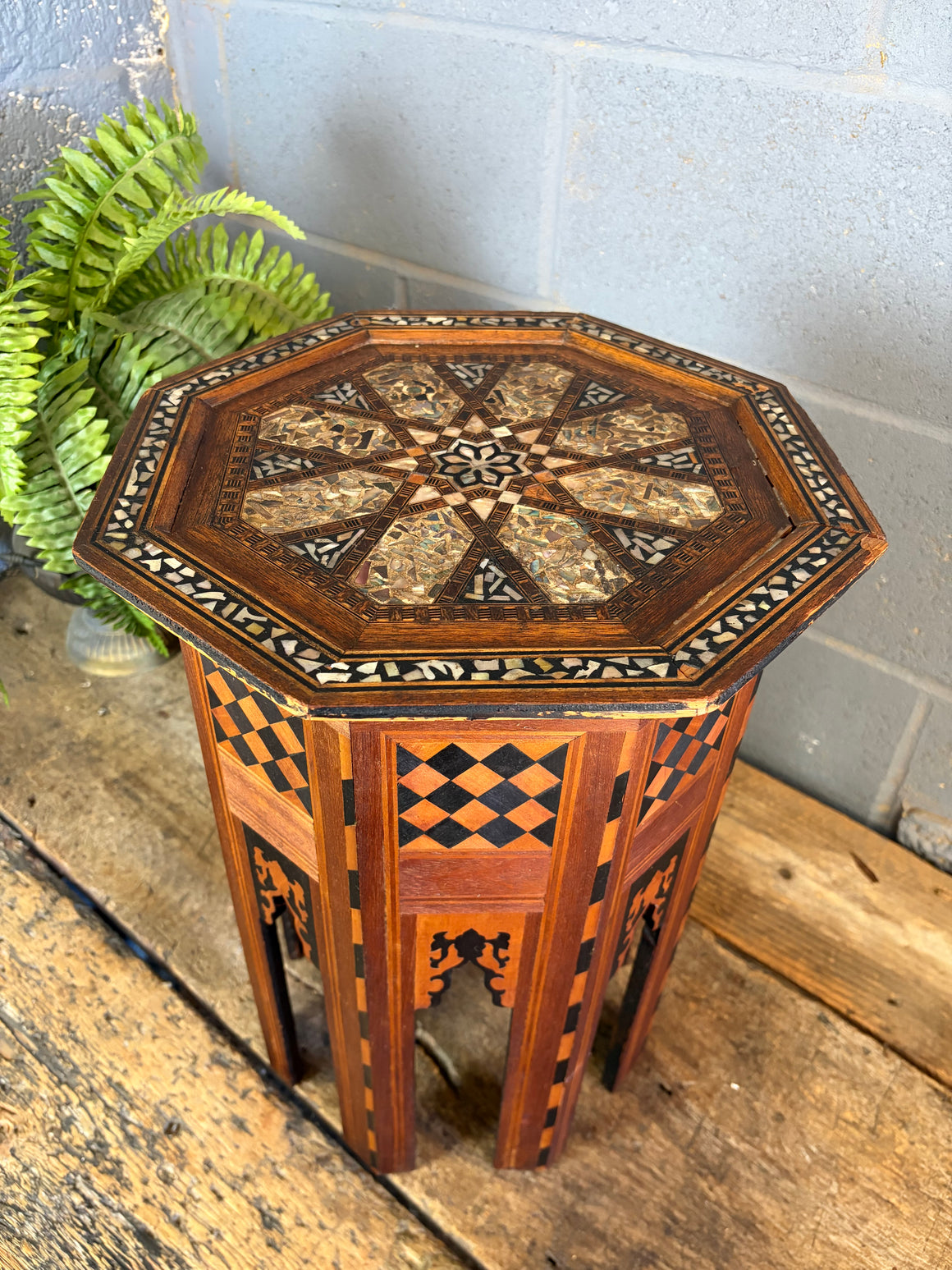 An octagonal Moorish inlaid side table