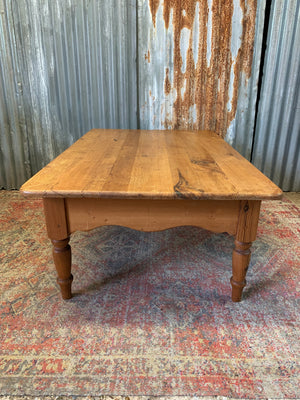 A large pine coffee table