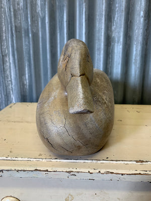 A wooden duck decoy
