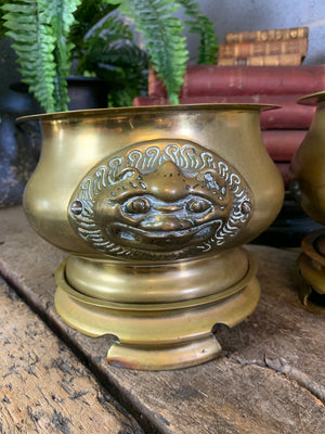 A pair of Asain bronze jardinieres on stands
