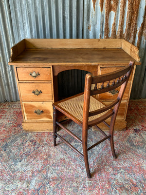 A pine clerk's desk with galleried top