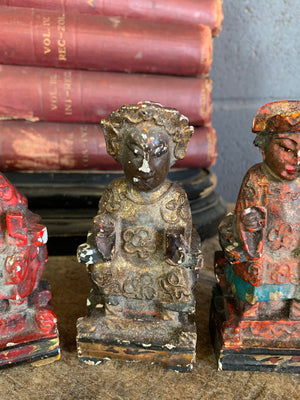 A group of four Chinese carved wood and gesso figures