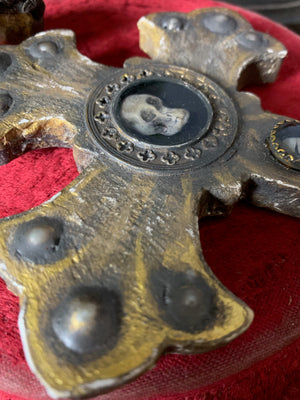 A set of oversized wooden rosary beads with memento mori motif