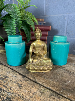 A bronze seated Buddha figure