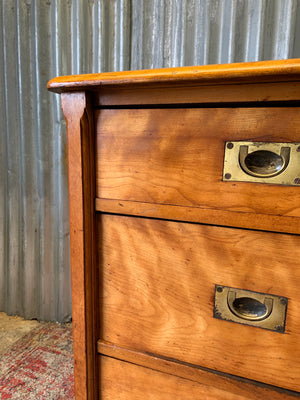 A satinwood chest of drawers