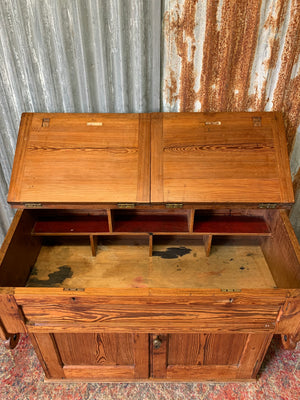 A pine double lectern standing desk