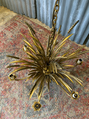 A chandelier in the form of a wheatsheaf