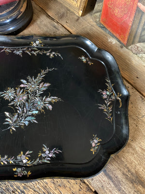 A large mother of pearl inlaid lacquered tray