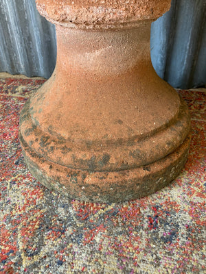 A pair of large terracotta acanthus urns