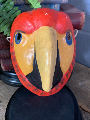 A Ukrainian papier-mâché mask of a macaw