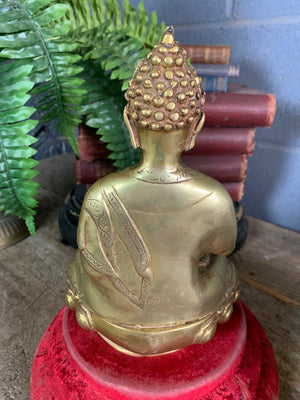 A bronze seated Buddha figure