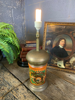 A converted tobacco jar lamp