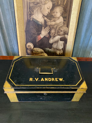 A Victorian black metal strong box with lock and key