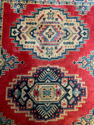 A Persian pink and green ground silk and wool rug ~ 165cm X 92cm