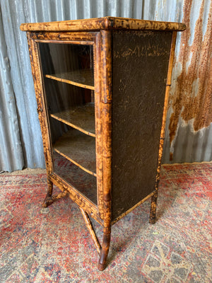 A tiger bamboo display cabinet
