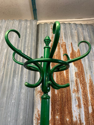 A tall bentwood coat stand with hat rack