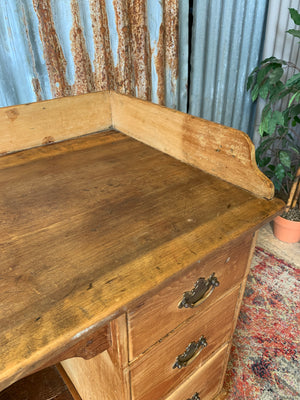 A pine clerk's desk with galleried top