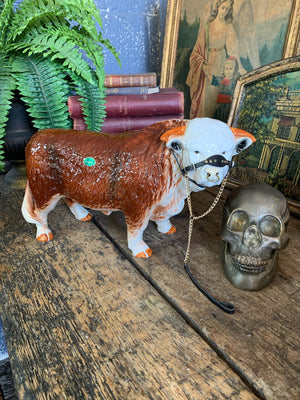 A large ceramic Hereford bull by Nelson Pottery