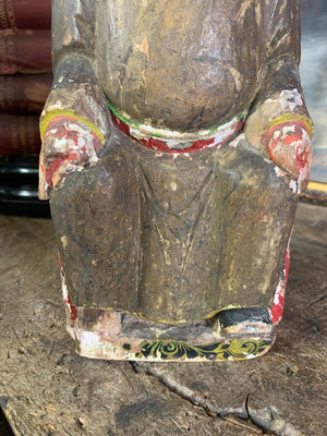 A hand carved Taoist figure