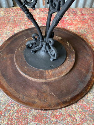 A black cast iron pub table