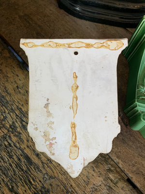 A pair of neoclassical ceramic wall pockets