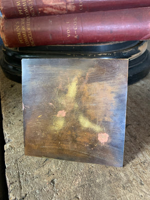 A group of four etched brass Egyptian revival pyramids